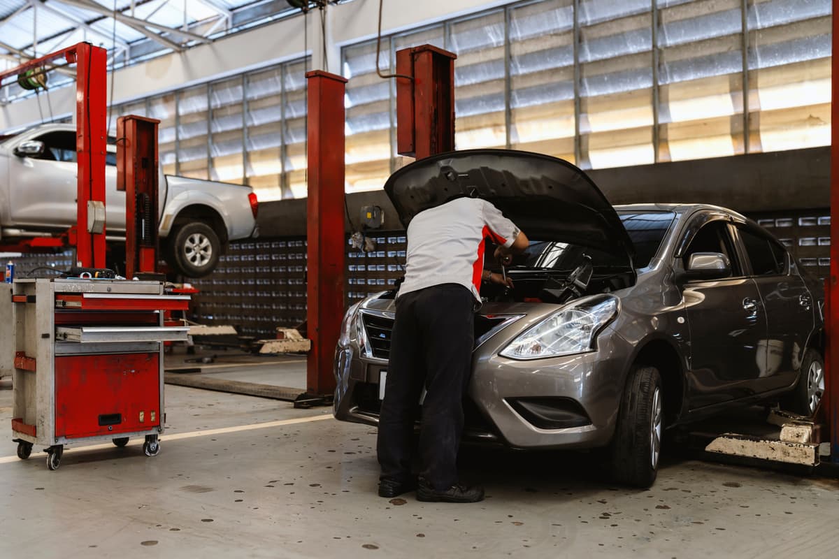 Mechanic working on a car